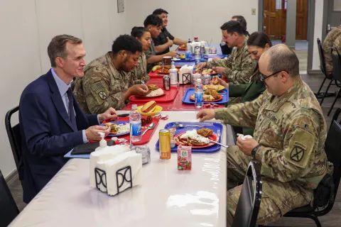 Congressman George Whitesides spends time with U.S. service members stationed in Iraq.